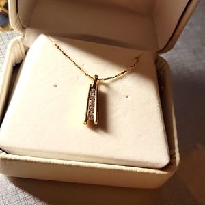 14k and 10k with diamonds pendant and chain. JCPenny